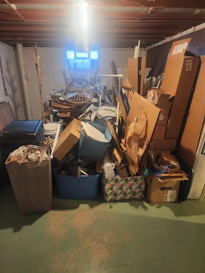 Roll-off dumpster container at job site for Cleanout Dumpster Rental in Plymouth